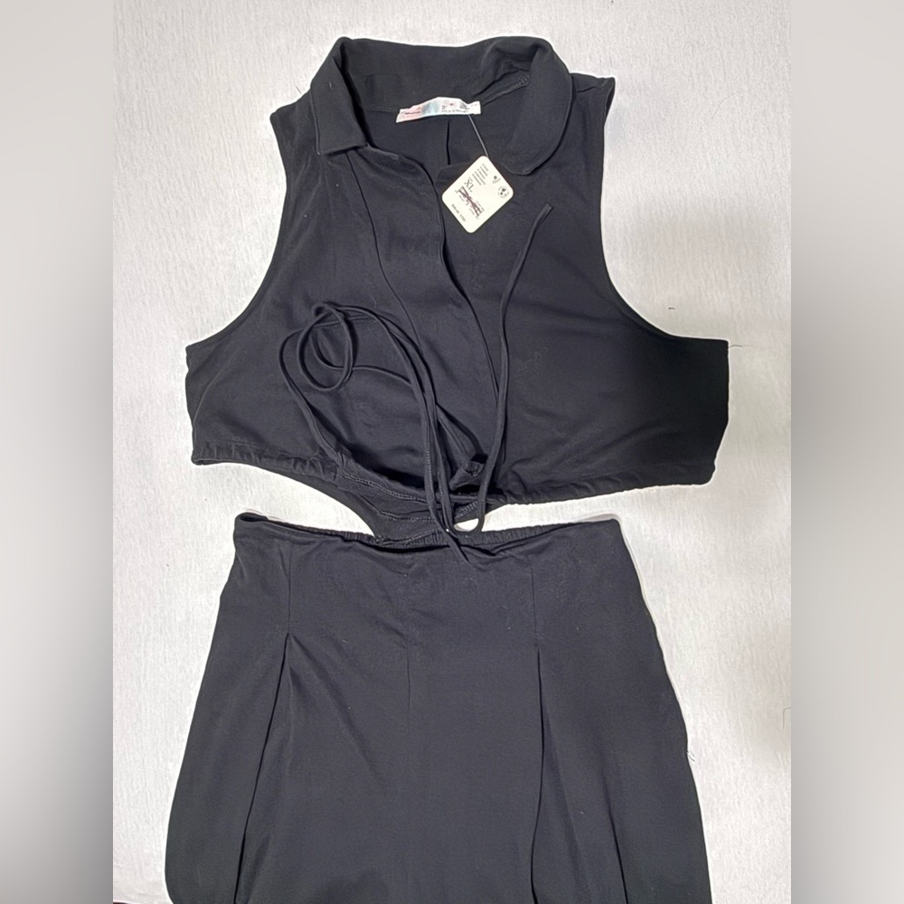 NWT FREE PEOPLE Beach One piece vest/pant
Size XL Black